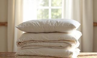 Piled home bedding and curtains, freshly cleaned